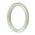 A beautiful pale green Burmese jade bangle bracelet, untreated and made with genuine jade. The bracelet has a semi-round shape and measures 62mm in diameter. Perfect for adding a touch of elegance to any outfit.