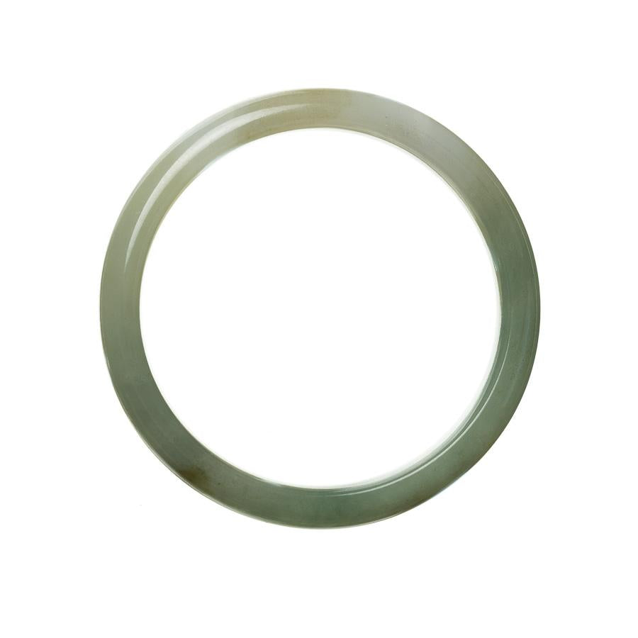 A close-up of a beautiful green jade bracelet with a half moon shape, showcasing the natural beauty of untreated jade.