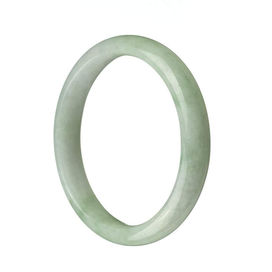 A pale green jadeite bangle with a half moon shape, measuring 56mm. This authentic Grade A jadeite bangle is a stunning piece from MAYS GEMS.