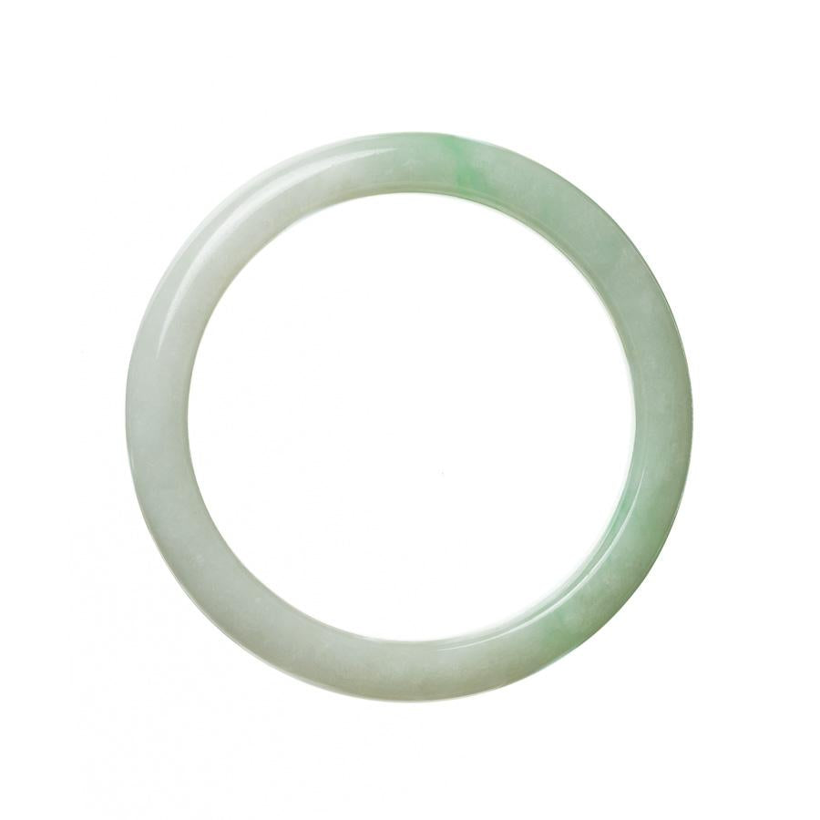 A close-up image of a beautiful, green jadeite jade bracelet. The bracelet features a half-moon shape and measures 63mm in size. It is certified as Grade A, ensuring its high quality and authenticity. The bracelet is a stunning piece of jewelry from the MAYS™ collection.