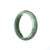 A half-moon shaped child's bangle made of authentic Grade A Green Burmese Jade, crafted by MAYS™.