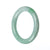 A round green jade bracelet, made of genuine Grade A traditional jade, measuring 58mm in size. Sold by MAYS GEMS.