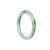 A round, child-sized Burmese jade bangle in a vibrant green color, exuding elegance and natural beauty.