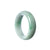A half-moon shaped green Burmese jade bracelet, specially designed for children.