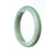 Image of a green jade bracelet with a semi-round shape, measuring 76mm in diameter. The jade is untreated and has a traditional style, representing authenticity and natural beauty. This bracelet is part of the MAYS™ collection.